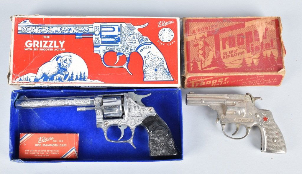 2-VINTAGE CAP GUNS, BOXED, HUBLEY & KILGORE: 9 1/2" Kilgore Grizzly is unfired and has box wear, the Hubley Trooper is unfired also, but box is missing one flap. Excellent