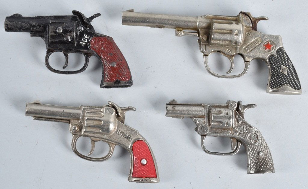 4-CAST IRON CAP GUNS: Lot includes Derby, Cub, Hero and Ace. Largest is 7", all worked when tested. Very Good-Excellent