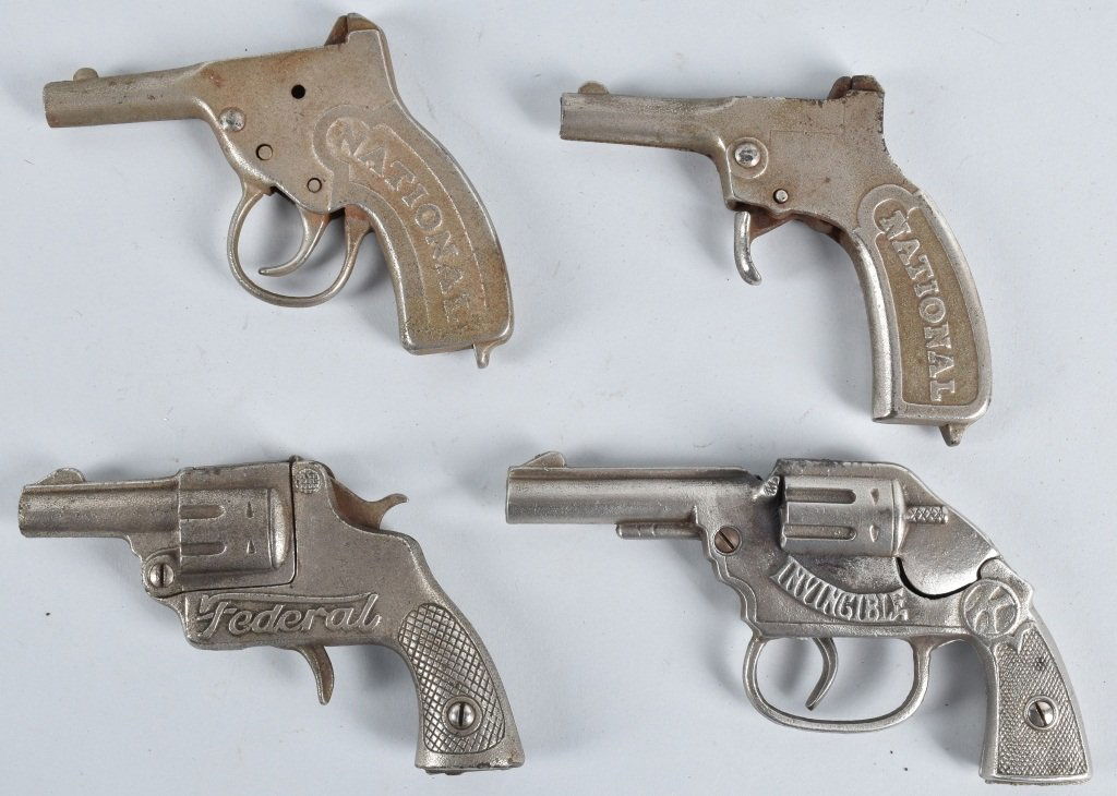 4-CAST IRON CAP GUNS: Nice lot with 2 Nationals, a Federal and an Invincible. Largest is 6 1/2". The Nationals and the Invincible worked when tested. The Federal does not. Very Good