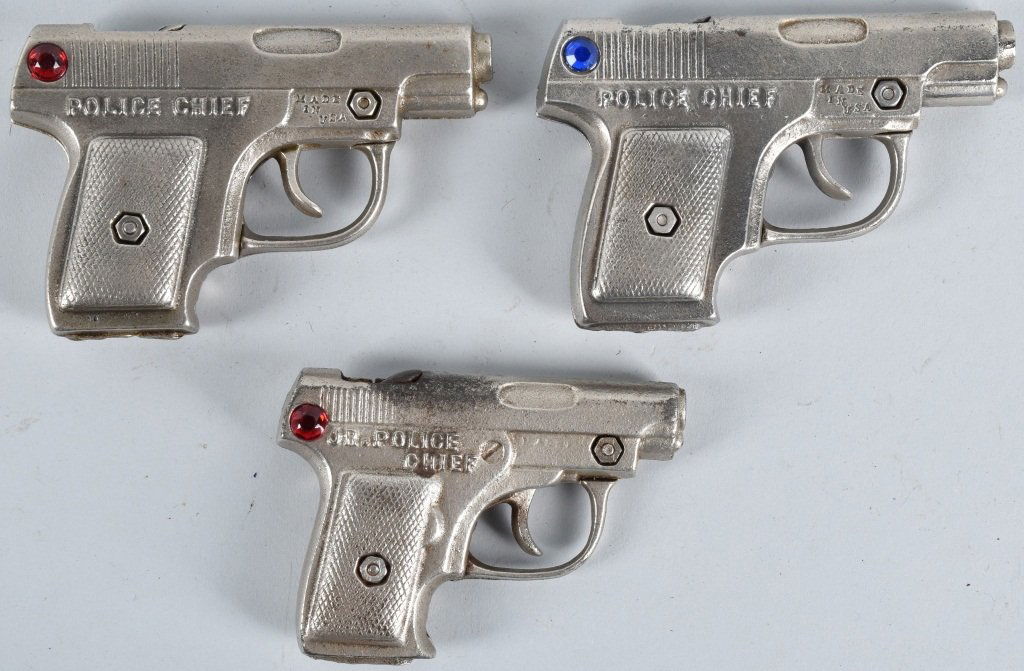 3-CAST IRON CAP GUNS with JEWELS: Lot includes 2 Police Chiefs and JR. Police Chief. Largest is 4 3/4", all worked when tested. Excellent