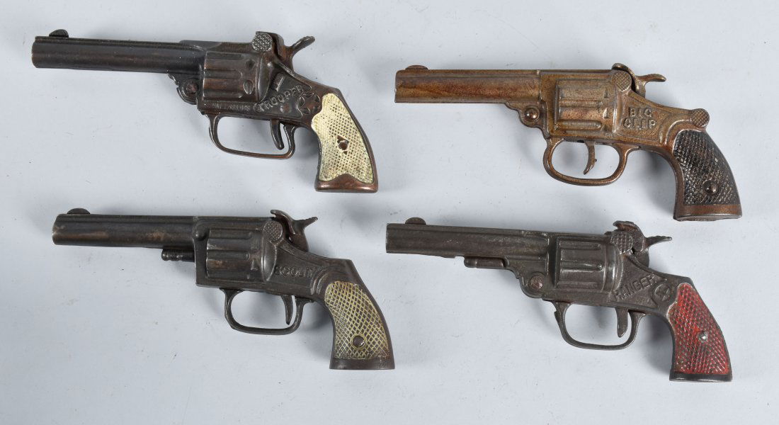 4-CAST IRON CAP GUNS: Nice lot with Trooper, Scout, Big Clip and Ranger. largest is 7 1/2", all worked when tested. Very Good
