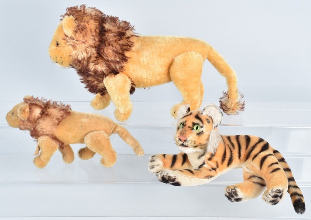 3-VINTAGE STEIFF ANIMALS: 1950'S-60'S Steiff animals with the largest 11". Both the Lions are jointed with cloth tags, the Tiger has no ID's. Very Good-Excellent