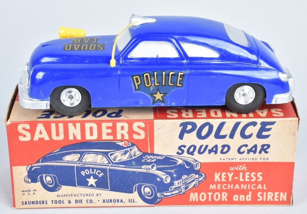 SAUNDERS FRICTION POLICE SQUAD CAR MIB: New Old Stock never played with. Friction needs oiled. Near Mint