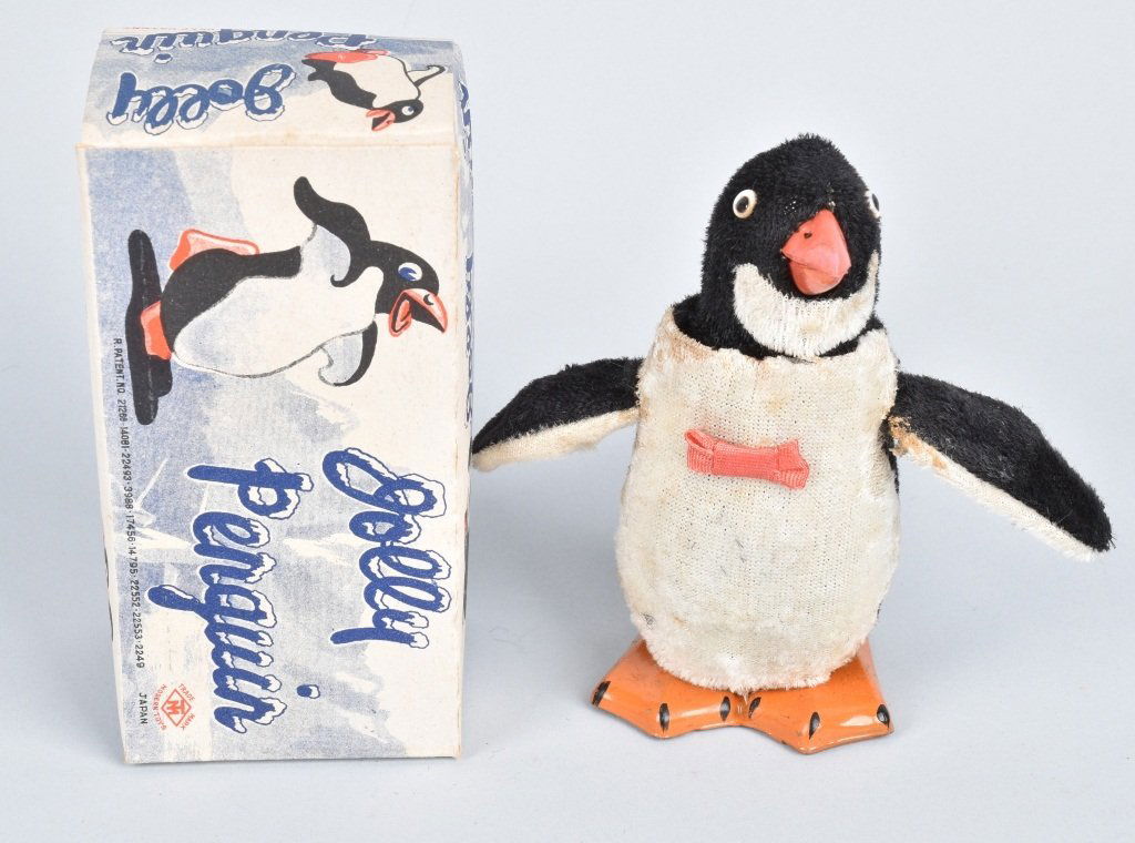 JAPAN Windup JOLLY PENGUIN w/ BOX: New Old Stock never played with. 5 1/2" Near Mint