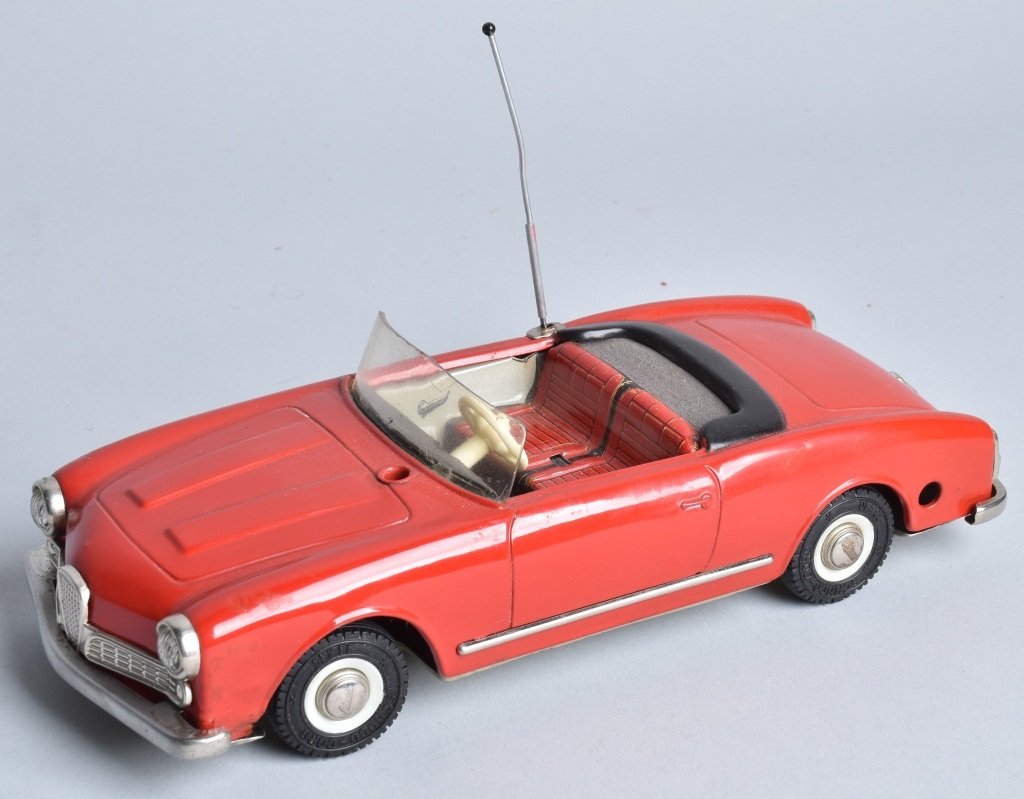 SCHUCO WINDUP MAGICO 2010 CAR: Schuco 2010 Magico Car. Works. Has been repainted. 9 1/2" Excellent