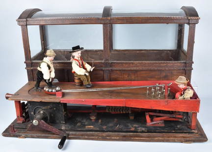 1907 BOWLING AUTOMATON w/ 3 BISQUE FIGURES: Wonderful and important Bowling Automaton with 3 Bisque Figures. Patented in 1907 by Otto Eichenberger of Switzerland with the assistance of Leon Brock of New York, this intricate and large automaton