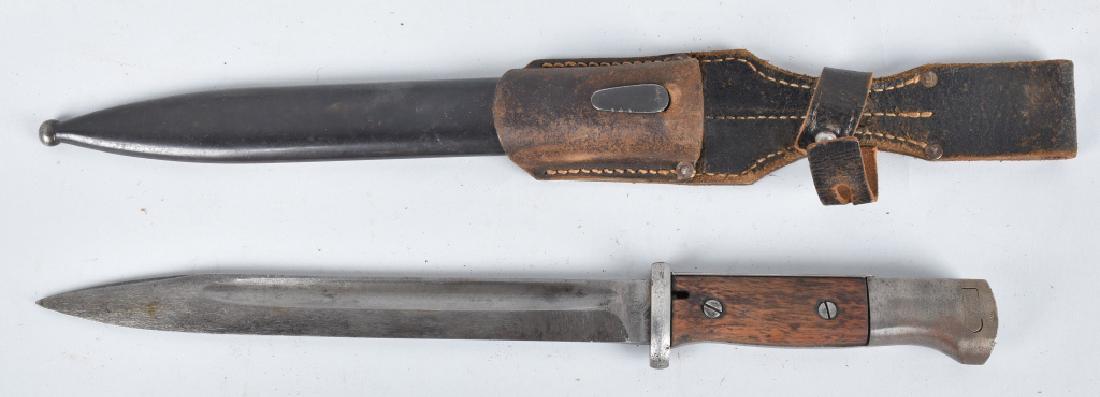 WW2 GERMAN MAUSER BAYONET & SHEATH: 15" with 9 3/4" blade, blade has been cleaned, good wood grips, nice scabbard with leather frog, serial numbers do not match. Very Good