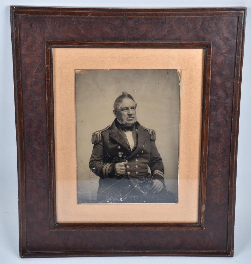 CIVIL WAR FULL PLATE AMBROTYPE NAVAL OFFICER: Fantastic full plate 8.5" by 6.5" ambrotype image of Federal Naval Officer. Great contrast and clarity, has some spidering to emulsion, but still displays great. Has been nicely framed. Very hard to f