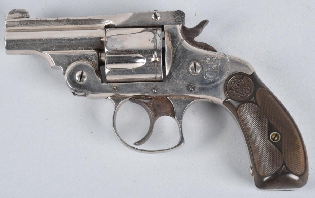 SMITH & WESSON, PERU, DA .38 REVOLVER: SN 536572, 2 1/4" barrel with very good bore, appears to be an old re-nickel, good hard rubber grips, crisp action. Very Good * Catalog Correction its a .38 not a .32
