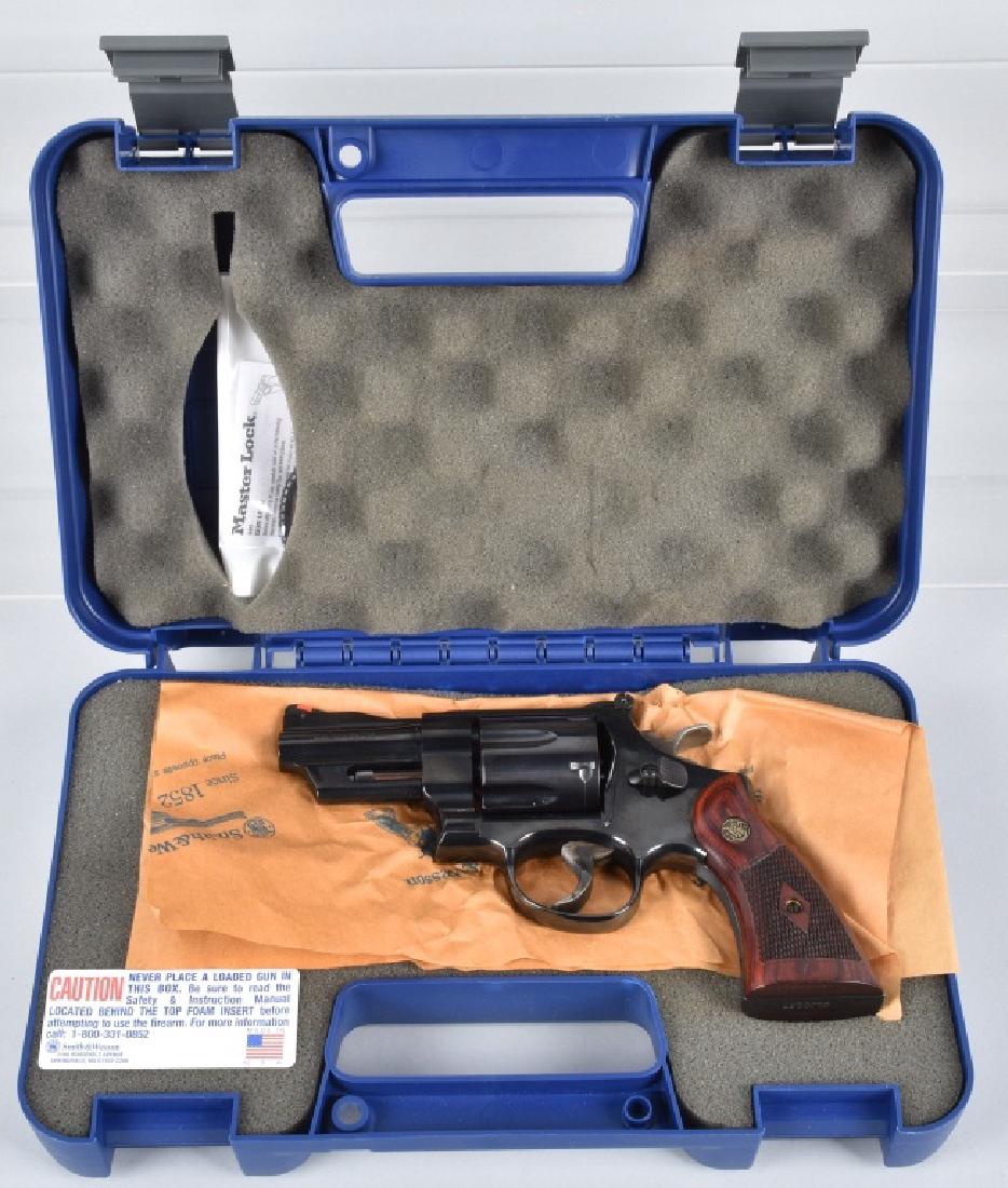 SMITH and WESSON .44 MAG. REVOLVER, BOXED: SN CLJ0237, 3" barrel with excellent bore, tight action, blue finish, checkered walnut grips, includes original box. Excellent-Near Mint*