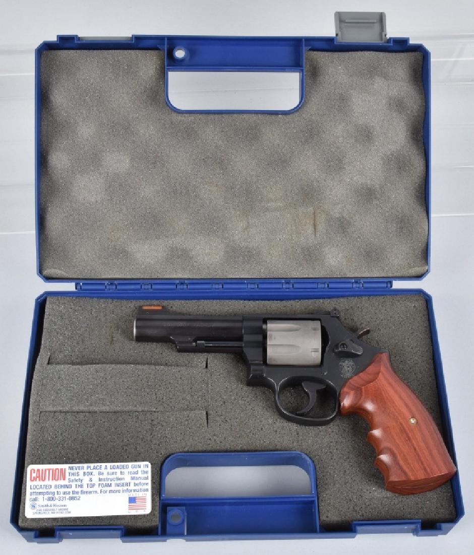 SMITH and WESSON .357 MAG. REVOLVER, BOXED: SN CJF0982, 4" barrel with excellent bore, tight action, nice finish and grips includes original box. Excellent-Near Mint*