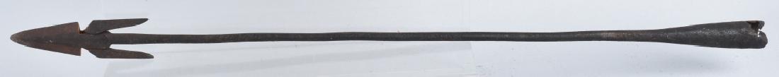 18th CENTURY WHALING HARPOON, MECHANICAL: Measures 37" long with a 3 1/2" spear pint, with 2 3" folding barbs. Solid construction with pitting from age. Part of wood pole is still inside. A great example of early nautical / whaling memorabili