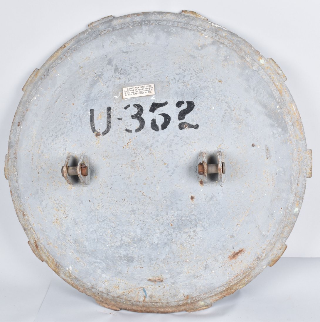 WW2 U-BOAT STORAGE HATCH COVER, U-352: About 36" diameter, from the wreck of German Submarine U-352 which was sunk off Cape Lookout, NC by the USCG Cutter Icarus in 1942. Includes various paperwork about the U-Boat. Very Good
