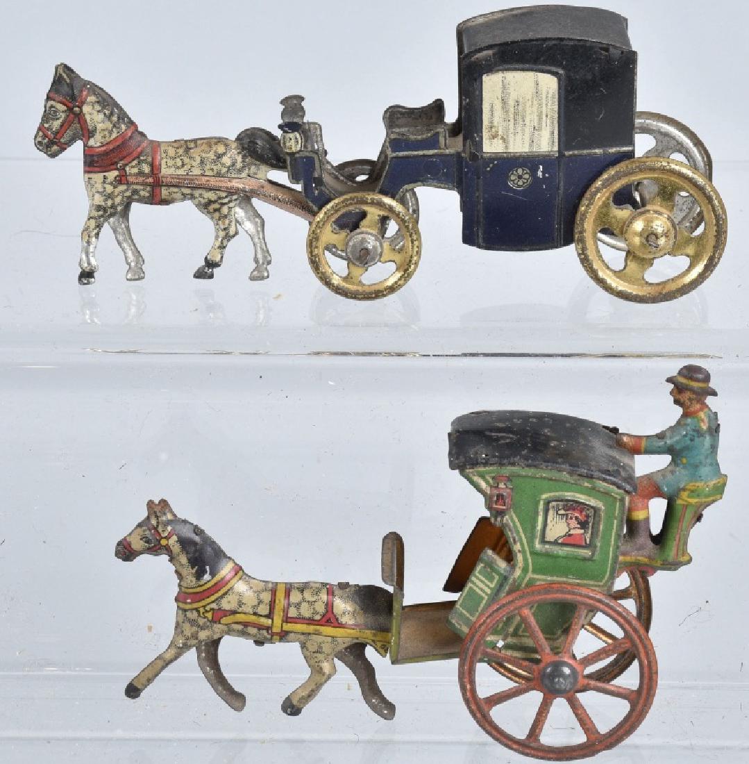 2- GERMAN PENNY TOY HANDSOME CABS (1 of 3)