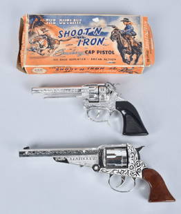 2-CAP GUNS, BOXED OUTLAW & KENTUCKY 12: Nice lot with used boxed Outlaw Shooting Iron made in England, along with an unboxed Kentucky 12 made by Crescent Toy Co. Outlaw is Very Good, Kentucky 12 is Excellent-Near Mint