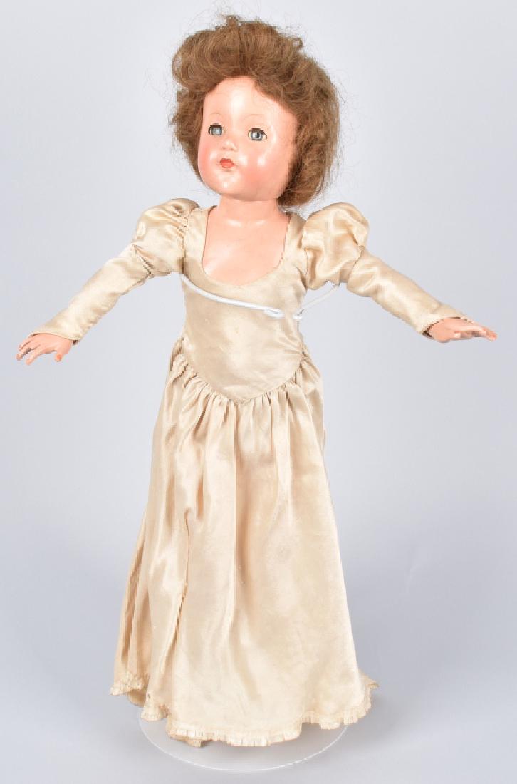 EFFANBEE COMPOSITION ANNE SHIRLEY DOLL: 22" tall, nice original Anne of Green Gables doll with some light soiling and wear. Has some minor crazing lines in face. Stings need to be tightened. Displays well. Very Good