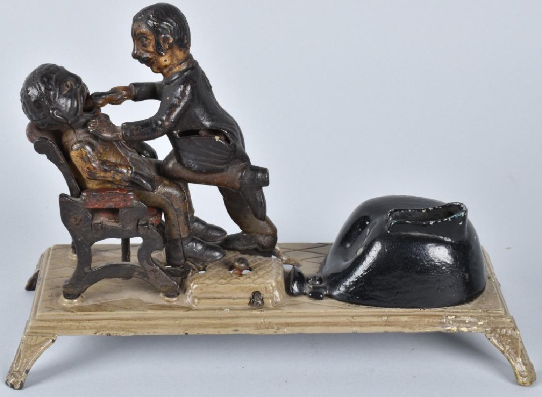 J&E STEVENS DENTIST MECHANICAL BANK (1 of 7)