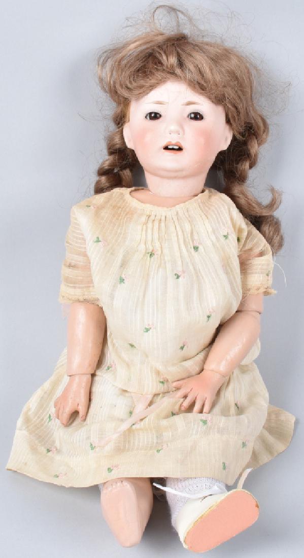 15" F.Y. NIPPON BISQUE DOLL: Original bisque doll from Japan. Head is marked F.Y. Nippon. Doll has fixed eyes and open mouth with teeth. Head has tight crack. Doll still displays well. Jointed body. 15" very Good