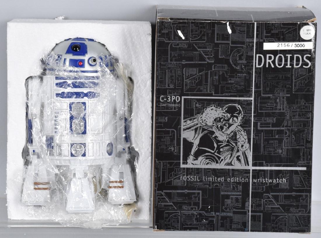 FOSSIL Limited edition DROIDS WRIST WATCH MIB: Fossil Limited Edition of 3000 Droids Watch. R2-D2 and C-3PO Wrist watch in R2-D2 Case. Never worn. In box with paper. Near Mint