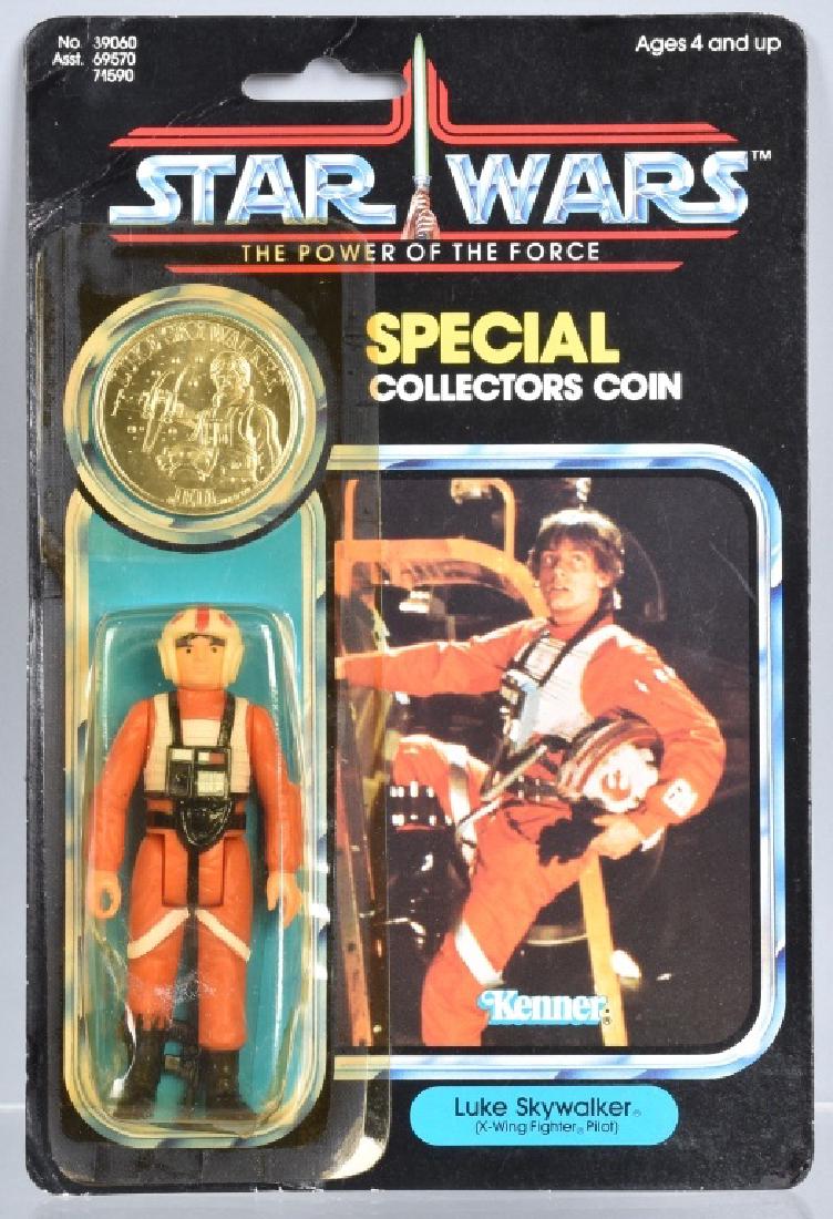 1985 STAR WARS POTF LUKE X-WING FIGHTER MOC: 1985 Star Wars Power Of The Force Luke Skywalker X-Wing Fighter Action Figure. Figure is mint sealed on the card. Comes with Collector Coin. Card is crisp. Perfect candidate for grading. Excellent-Nea