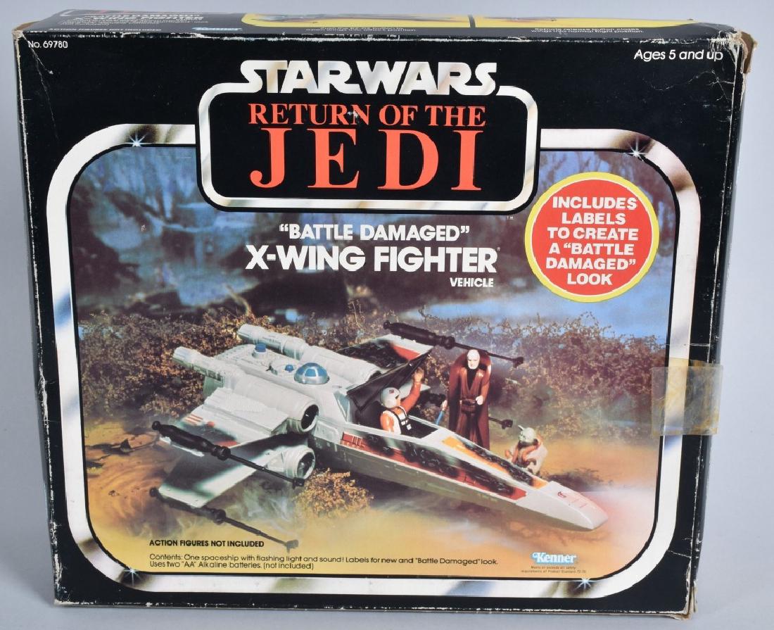 STAR WARS ROTJ BATTLE DAMAGED X-WING FIGHTER MIB: 1983 Star Wars Return of the Jedi "Battle Damaged" X-Wing Fighter. Mint in the box with insert and papers. Tape has come loose from box.