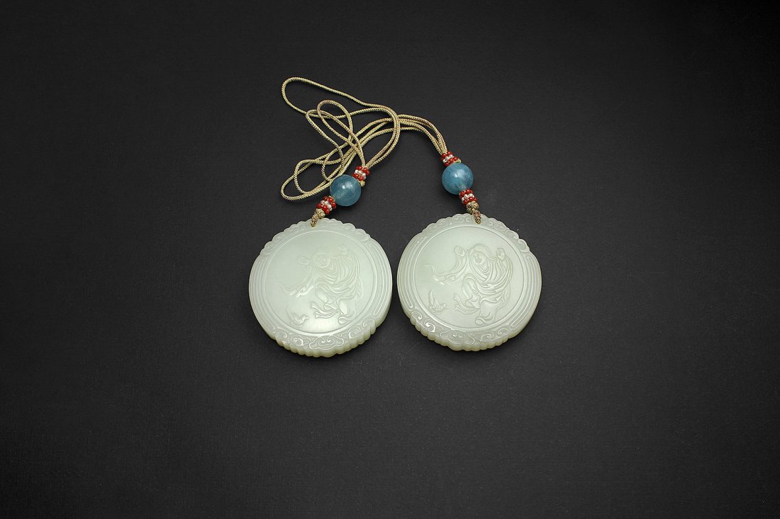 A pair of jade Hehe Erxian plaques (1 of 4)