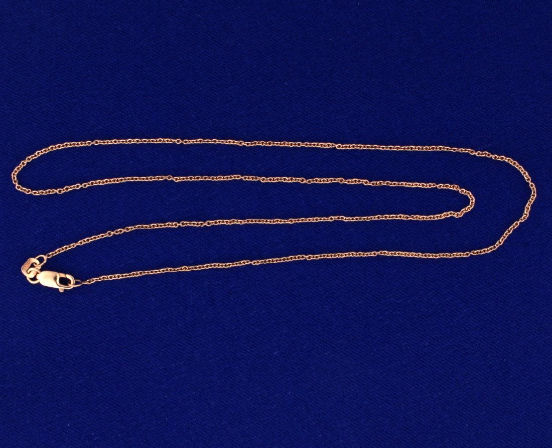 18 Inch Rose Gold Link Chain: In 14k rose gold. 1.2mm thick with a lobster clasp. 1.8g.
