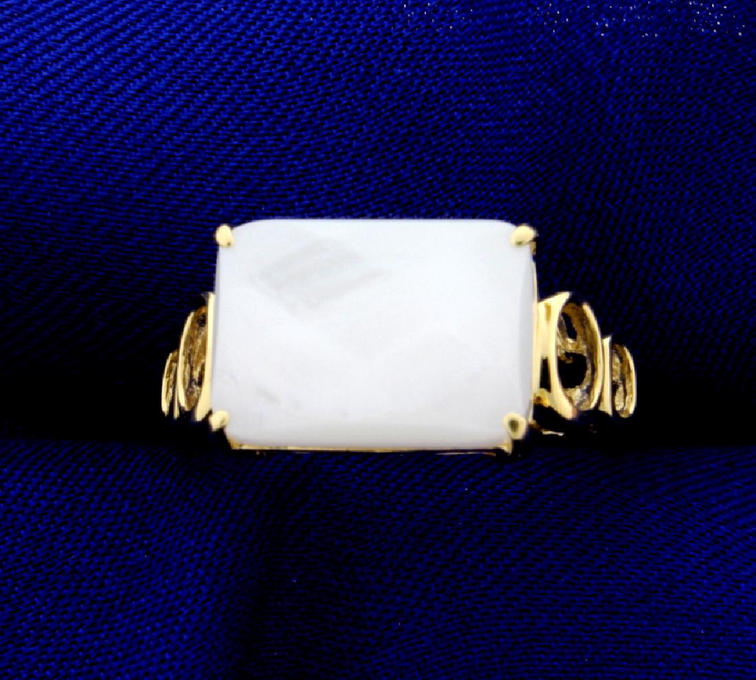 6ct White Chalcedony Ring: In 14K yellow gold, there is a 14x10mm chalcedony gemstone for a very unique look. Size 8 1/4 4.2g