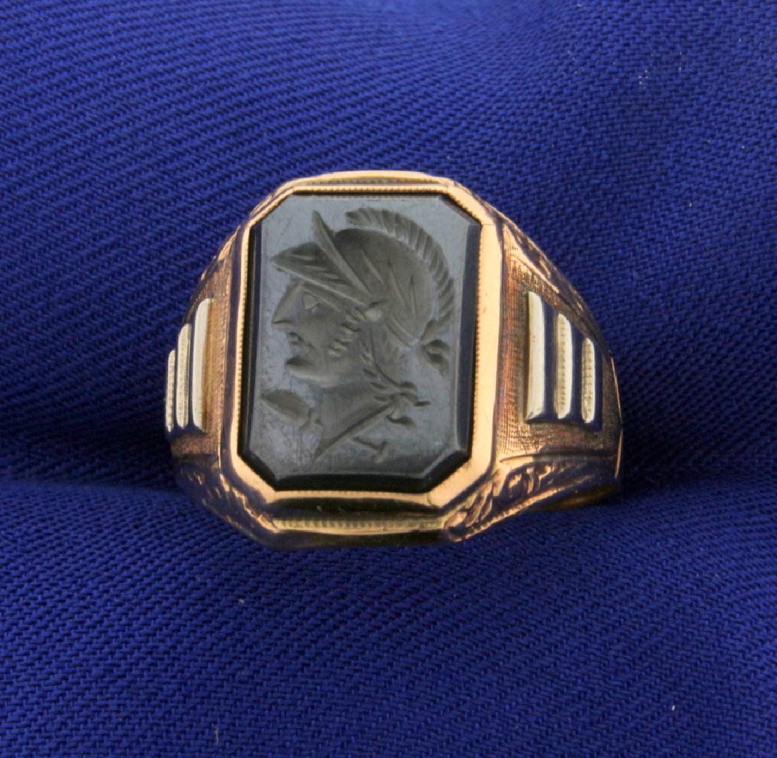 Hematite Gladiator Signet Ring in Rose Gold: In 10k rose gold with a 4 x 10mm carved gladiator. Size 10 3/4. 6.3g.