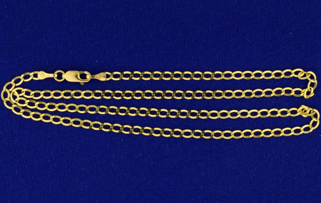 Italian Made 18 1/4 Inch Cuban Flat Link Chain: In 10k yellow gold. 3.1mm wide. 4.1g.