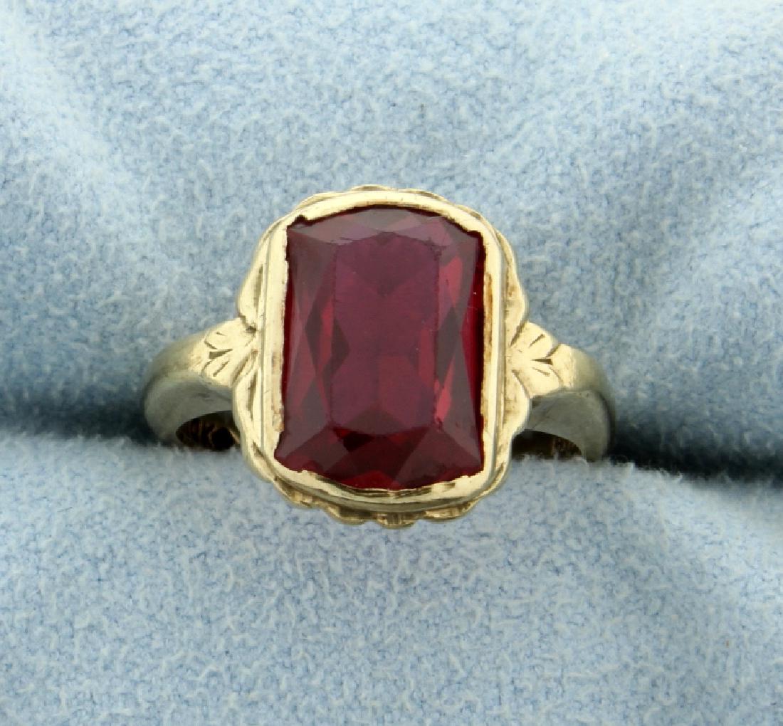 Lab Ruby Ring: In 10K yellow gold the 12x8mm lab ruby has excellent color and clarity. Size 5 1/2 3.5g