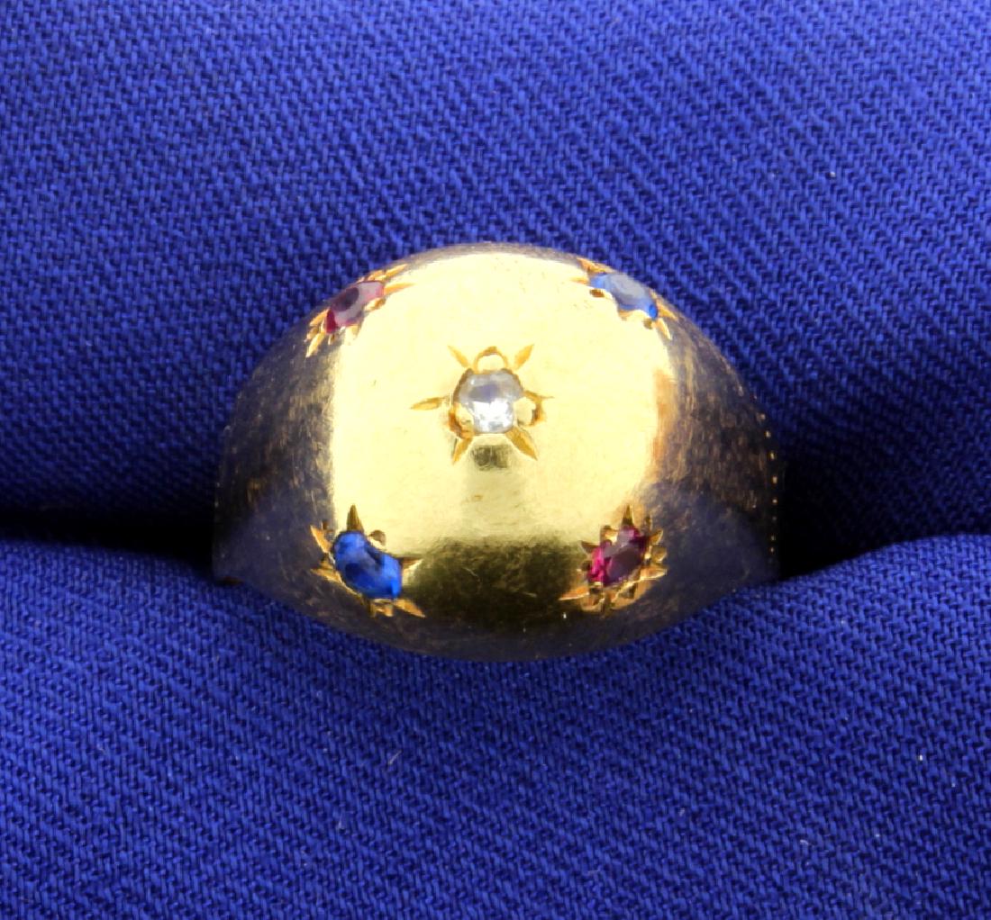 18k Gold Multi-Gemstone Dome Ring: In 18K yellow gold, this ring contains five 2mm round gemstones-two blue spinel, two red spinel & one white sapphire. Size 9 5.4g
