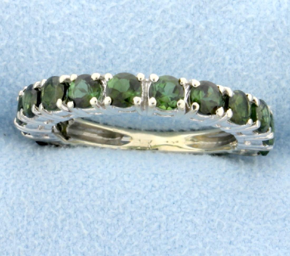 1.3ct Total Weight Chrome Diopside Ring: 14K white gold, there are thirteen 3mm round chrome diopside gemstones. Size 5 1/4 3.1g