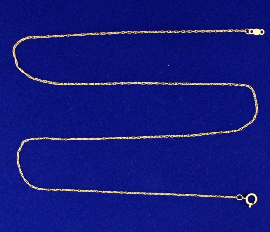 19 1/4 Inch Rope Style Neck Chain: In 14k yellow gold, .75mm thick. 1.0g.