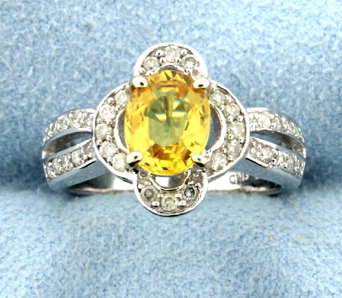 2 ct Natural Yellow Sapphire and Diamond Ring: In 14k White Gold. 2 ct oval shaped natural yellow sapphire has brilliant, intense yellow color and good clarity. Also contains 1/3 ct of high quality brilliant cut diamonds with SI2 clarity and I col