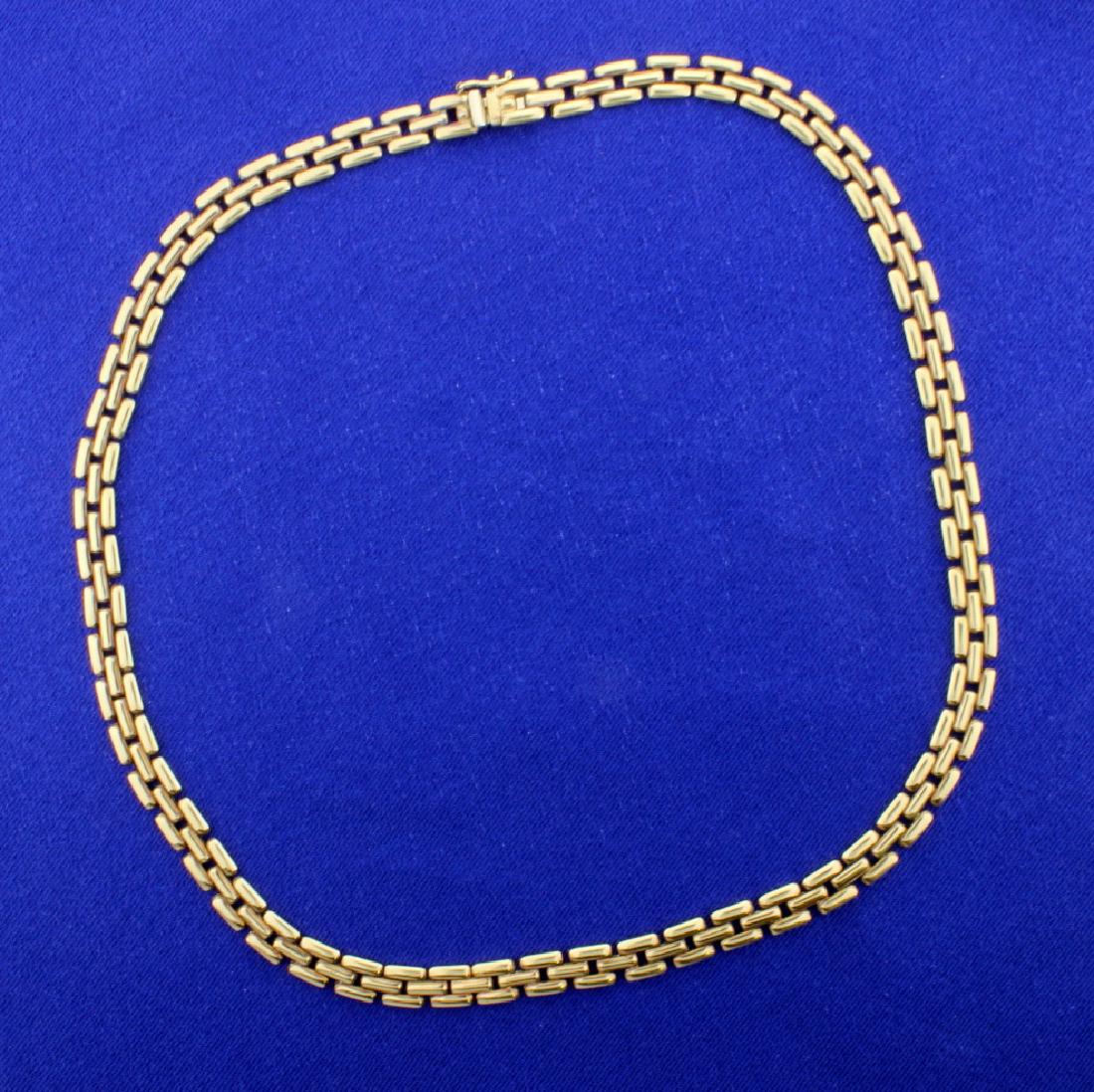 Panther Link Chain: In 14k yellow gold this chain is 16 1/2inches long by 6.3mm wide. It is Italian made with a safety clasp. 29.4g