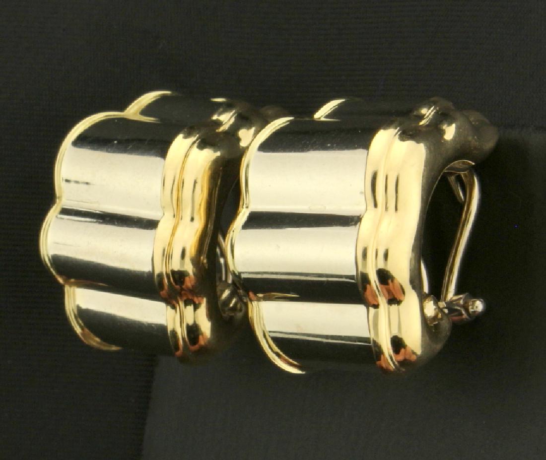 Italian Made Unique Designer Earrings: In 14k yellow and white gold. 1" long with clip backs. Very Unique Design 9.6g.