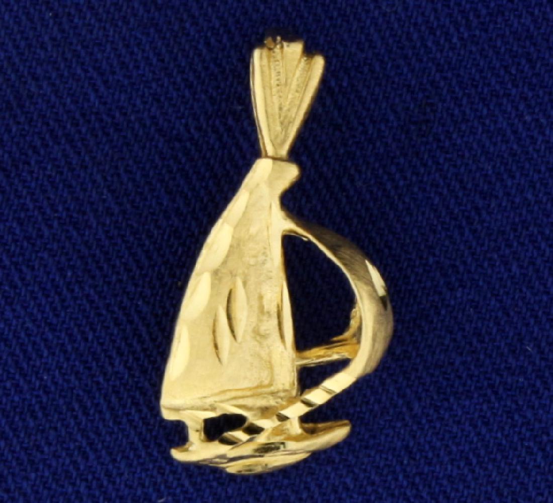 Sail Boat Pendant/Charm: In 14k yellow gold, 1" long with bale. 1.7g.