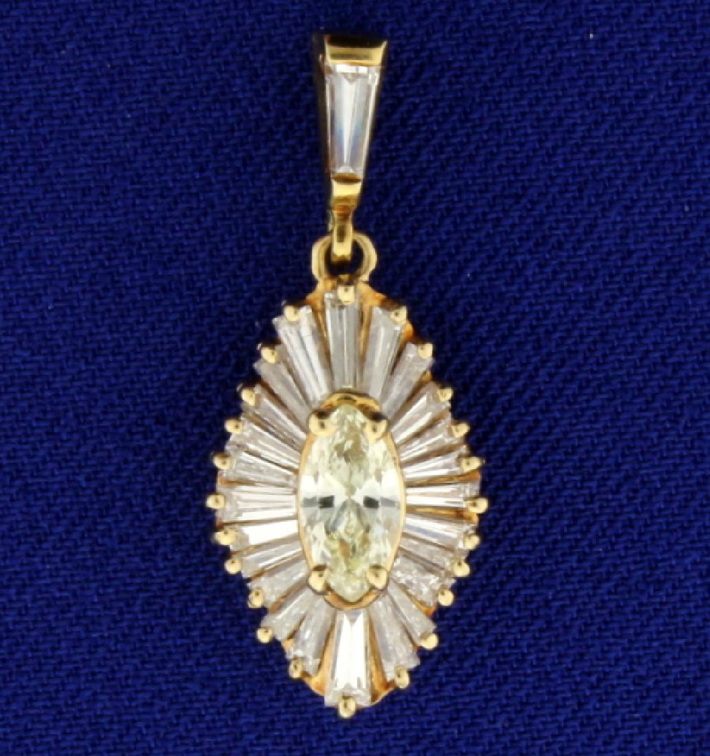 2ct TW Diamond Pendant: In 14k yellow gold, 1 inch long. Center diamond is .4 ct Marquise, with a clarity of SI and a color of M, surrounded by 1.6 ct of Baguette diamonds, with a clarity of SI and a color of G. 2.3g