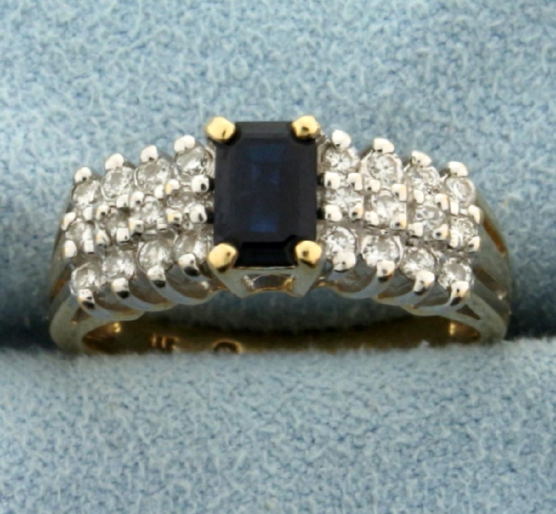 Natural Sapphire and Diamond Ring: In 14k yellow gold, containing a 1/2 ct 6x4mm emerald cut natural sapphire with a deep blue color and excellent clarity. Also contains 1/4 ct TW of high quality diamonds - SI clarity/G color. Size 6 1