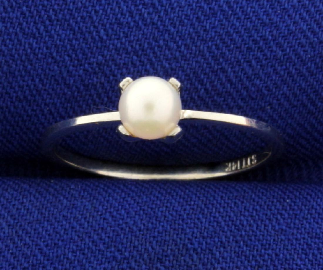 Akoya Pearl Solitaire Ring in 14k White Gold: In 14k white gold. Contains 4.5mm high quality akoya pearl with excellent luster and color. Size 6. 1.1g.