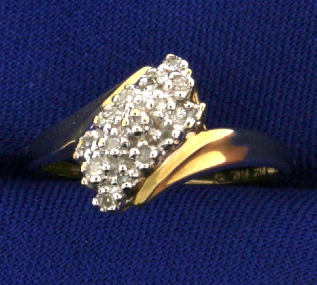 Waterfall 1/4 Ct TW Diamond Ring: The 10k ring contains 15 brilliant cut diamonds with SI clarity and J color. Ring is waterfall style and is a size 7. 1.9g