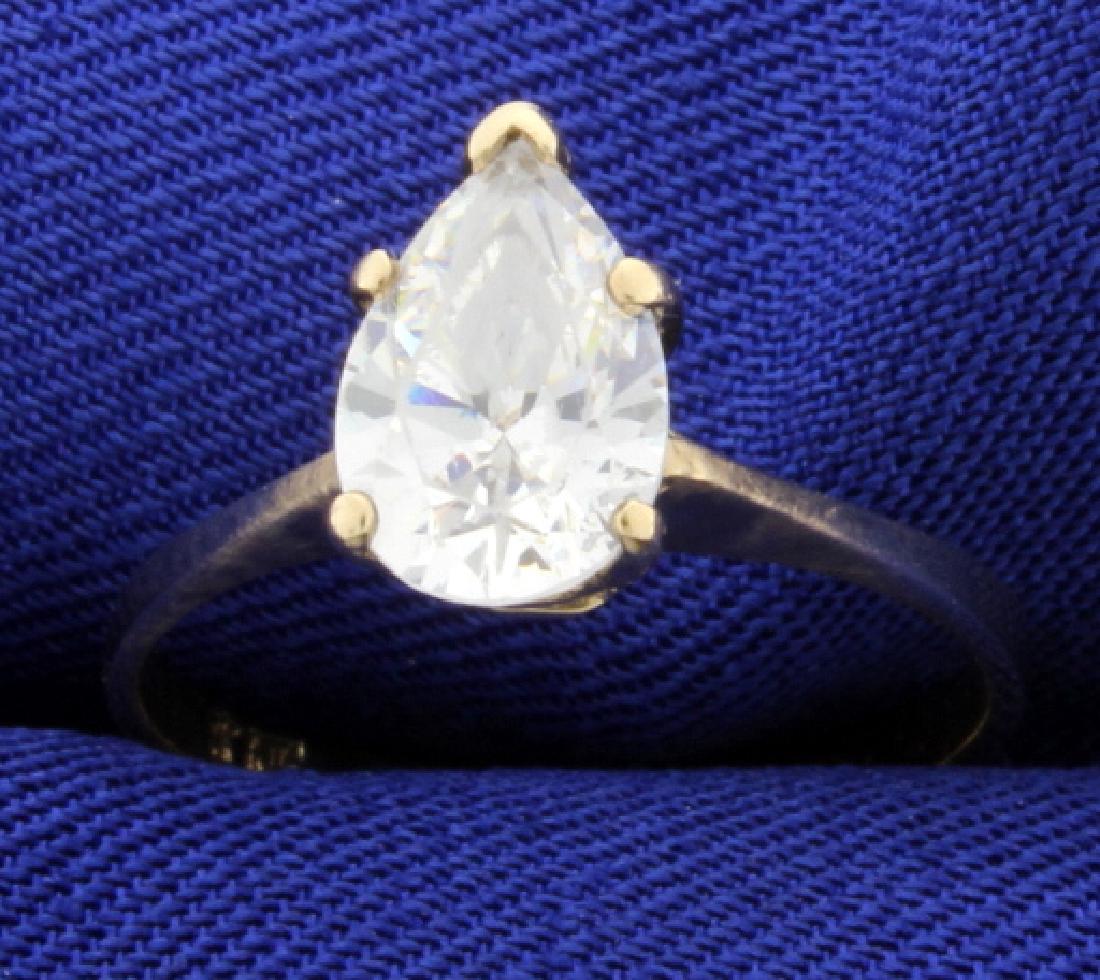1.5ct CZ Solitaire Ring: This 10K yellow gold ring contains 1.5ct pear shaped CZ. Size 6 1.9g