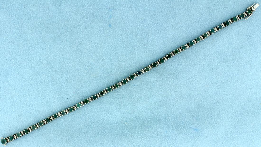 3ct TW Alexandrite Bracelet in White Gold: In 10k white gold. Contains thirty four natural 3mm round color changing Alexandrite gemstones that change from green to red depending on light source. 7 1/2" long with safety clasp. 9.4g.