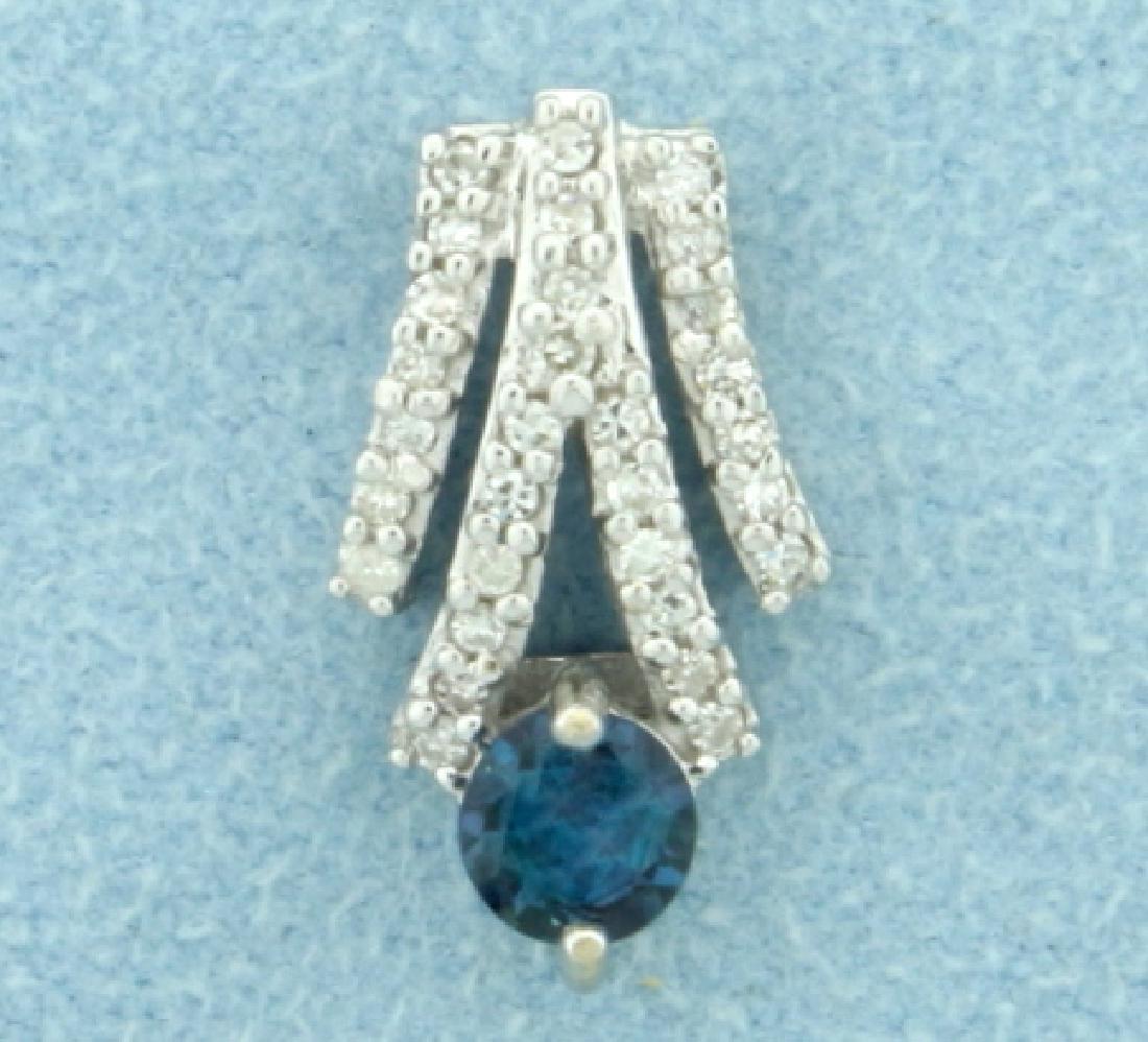 Alexandrite and Diamond Pendant in 14K White Gold: In 14K White Gold. Contains a natural 4.5mm color changing Alexandrite gemstone that turns from green to purple/red depending on light source. Also contains twenty eight high quality .01ct Diamonds, V