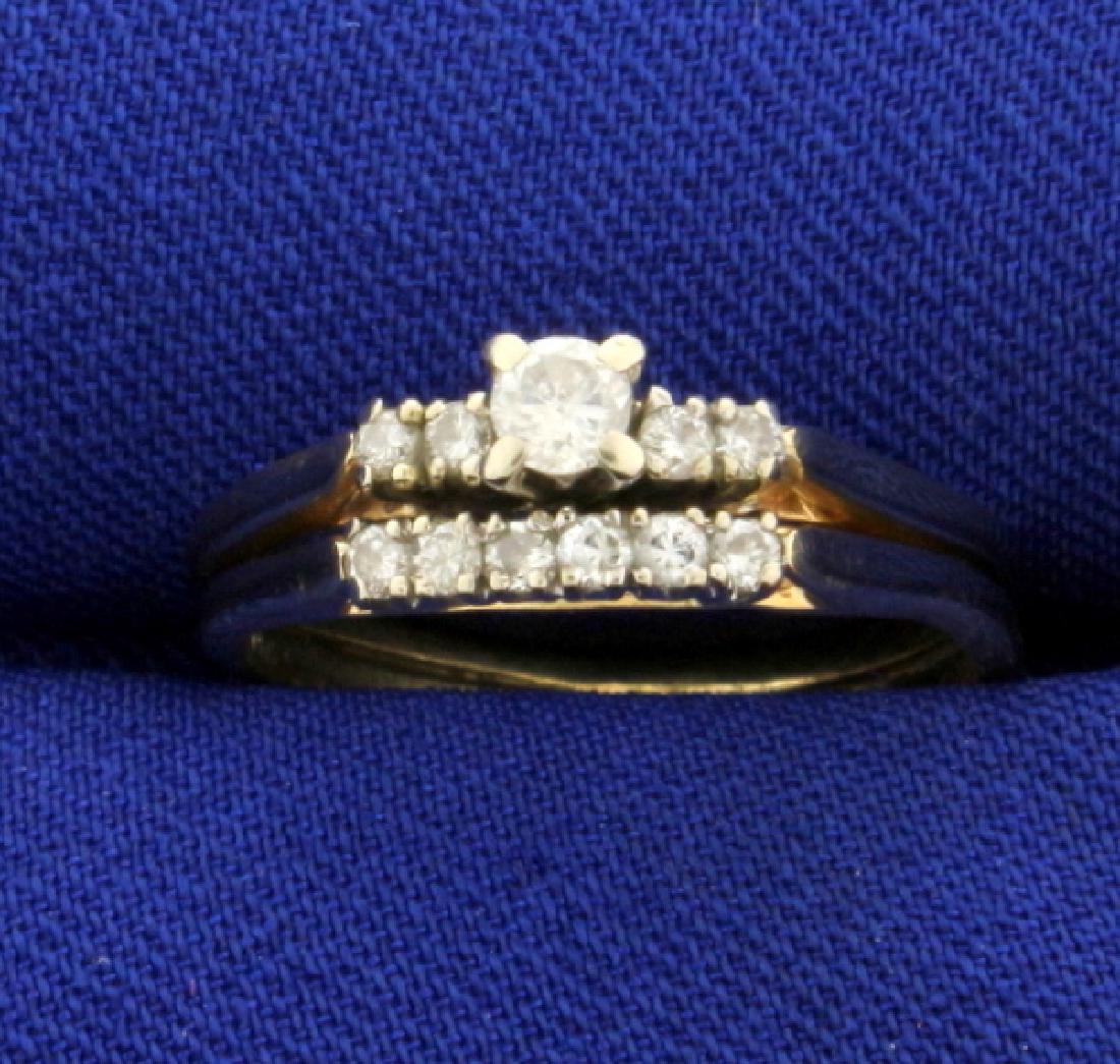 Diamond Wedding Ring Set in 14K Yellow Gold: In 14K Yellow Gold. Contains a.1ct Diamond and ten .01ct Diamonds, all high quality SI clarity/H color. Engagement ring and wedding band are soldered together. Size 5 1/2. 2.9g