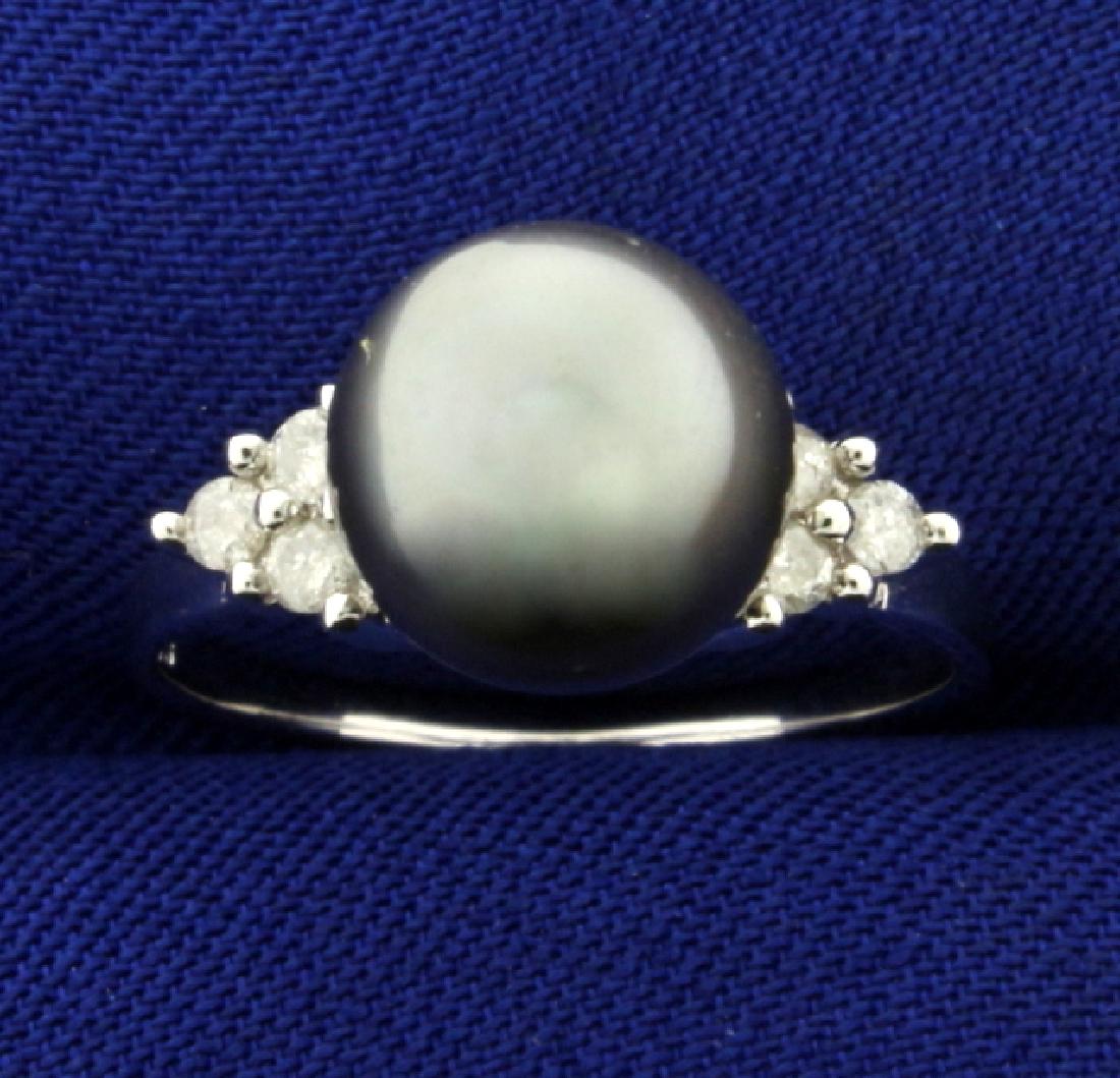Tahitian Pearl and Diamond Ring in 14k White Gold: In 14k white gold. Contains a 9mm Tahitian pearl with fantastic black silver color and high luster. Also contains six high quality .03ct diamonds, G color/I1 clarity. Size 6. 3.1g.