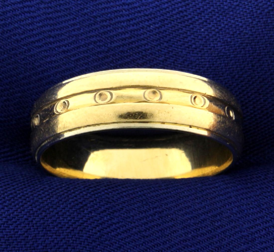 Unique Men's Wedding Band Ring: In 14k yellow gold with a unique design. Size 11 1/2. 6.6mm wide. 6.3g.