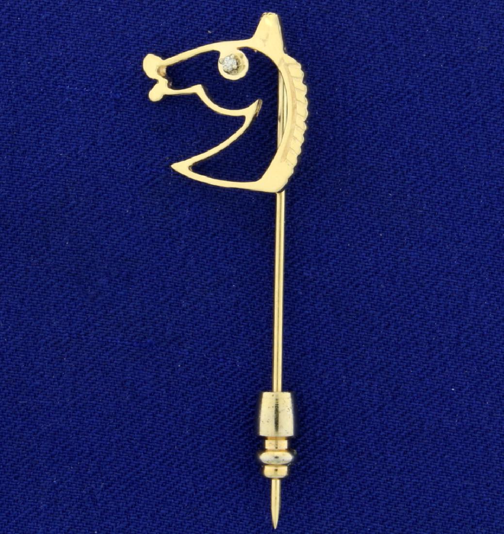 Diamond Horse Head Pin in 14K Yellow Gold: In 14K Yellow Gold. Contains a .01ct high quality Diamond. Horse head is 3/4" long, pin is 1 3/4" long. 2.6g
