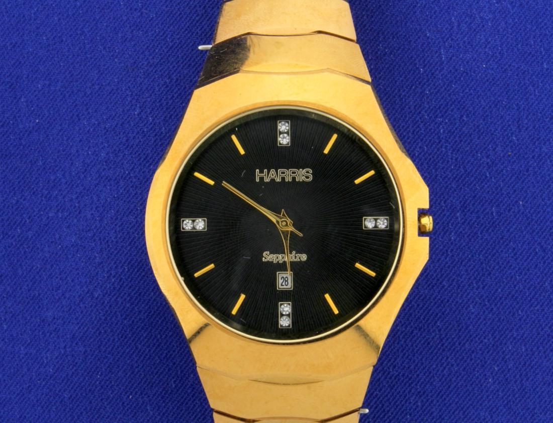Harris Men's Sapphire Tungsten Watch with Diamond Face: In Tungsten. Watch is in like new condition, even has original plastic wrap on back. Quartz movement runs great. 3 ATM water resistant, Sapphire crystal. Contains 8, .01ct Diamonds on face. Comes with